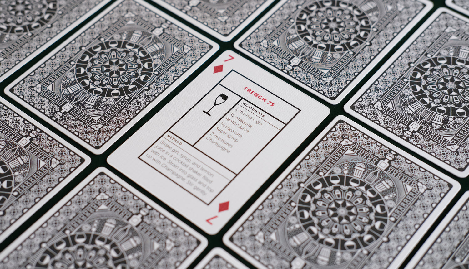 The French 75 Cocktail Card (7 diamonds) shown face up tiled with other cards shown face down.