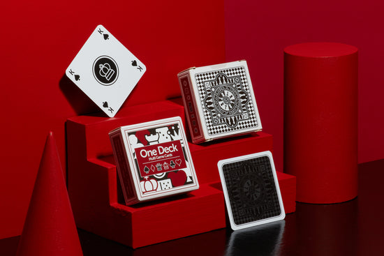 One Deck Game Cards in a stylised photo with red geometric objects