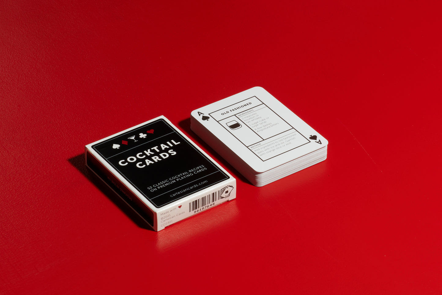 A deck of Cocktail Cards playing cards showing an Old Fashioned cocktail recipe