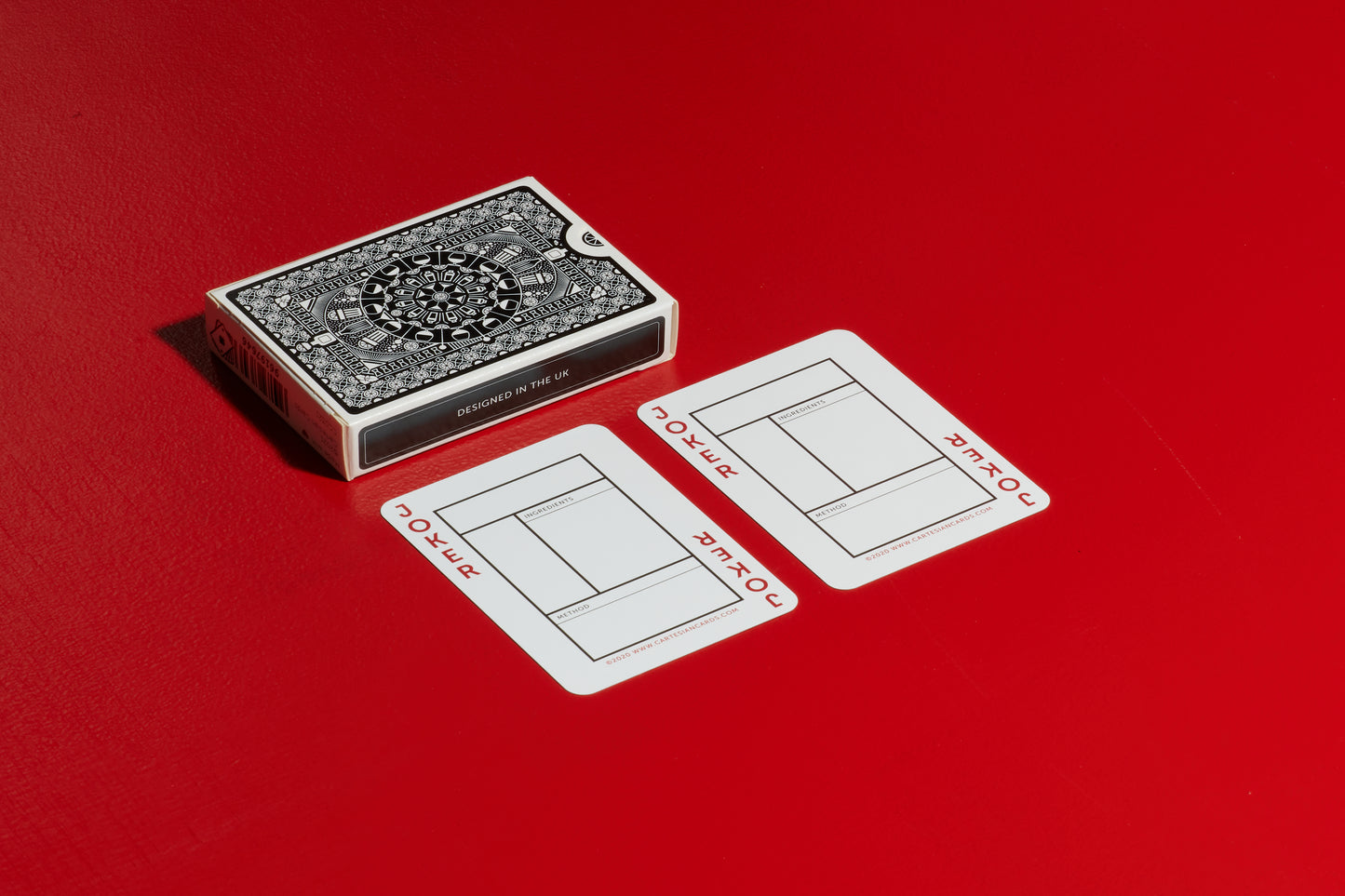 A deck Cocktail Cards playing cards showing 2 joker cards